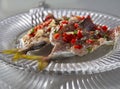 A delicious snack of pickled Mediterranean horse mackerel  Trachurus with garlic and hot red pepper in Greece Royalty Free Stock Photo