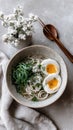 Delicious soba noodles with soft-boiled eggs and fresh garnishes Royalty Free Stock Photo