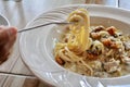 Delicious spaghetti cabonara on wooden table Royalty Free Stock Photo