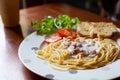 Delicious Spaghetti Carbonara with garlic bread on dish Royalty Free Stock Photo