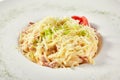 Delicious spaghetti carbonara with grated parmesan cheese Royalty Free Stock Photo