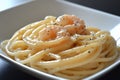 Delicious spaghetti with shrimp and pepper in a white bowl Royalty Free Stock Photo