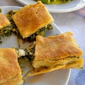 Delicious `spanakopita` traditional Greek spinach and feta pie portions