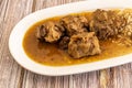 Delicious Spanish oxtail stew with white rice garnish Royalty Free Stock Photo