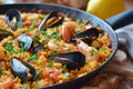 Delicious Spanish paella highlighting mussels and shrimps