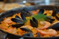 Delicious Spanish paella highlighting mussels and shrimps