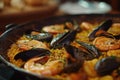 Delicious Spanish paella highlighting mussels and shrimps