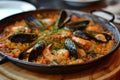 Delicious Spanish paella highlighting mussels and shrimps