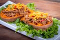 Delicious spicy pulled pork stuffed sweet potato dish