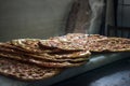 Delicious spicy and steamy stack of traditional Turkish pitas fresh out of oven