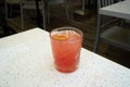 delicious spicy strawberry margarita outside of a bar or restaurant