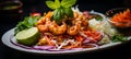 Delicious spicy thai seafood salad on black plate with vibrant background and copy space