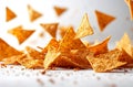 Delicious Spicy Tortilla Chips Falling and Landing on a White Surface Royalty Free Stock Photo
