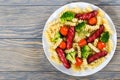 Delicious Spiral Pasta salad with broccoli, grilled sausages an Royalty Free Stock Photo