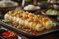 Delicious Squid Roll Appetizer on Elegant Dark Restaurant Table Setting with Asian Garnishes