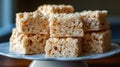 Delicious stack of crispy rice marshmallow treats on plate. Butter Rice Krispie Royalty Free Stock Photo
