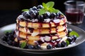 Delicious stack pancakes with berry fruit blueberry strawberry jam dessert