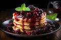 Delicious stack pancakes with berry fruit blueberry strawberry jam dessert