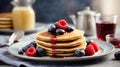 Delicious stack of pancakes close-up with fresh blueberry and raspberry Royalty Free Stock Photo