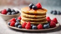 Delicious stack of pancakes close-up with fresh blueberry and raspberry Royalty Free Stock Photo