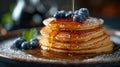 A delicious stack of pancakes, perfectly cooked and topped with fresh blueberries and sweet syrup Royalty Free Stock Photo