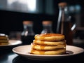 Delicious stack of puffy pancakes with honey topping.