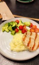 Delicious steak, mashed potatoes and salad with carbonate, tomatoes and cucumber Royalty Free Stock Photo