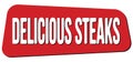 DELICIOUS STEAKS text on red trapeze stamp sign