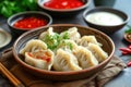 Delicious Steamed Dumplings with Dipping Sauces