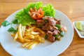 Delicious stir-fried beef with bell pepper and french fries