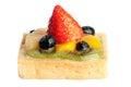 Delicious strawberry cake with pineapple orange kiwi and blueberries Royalty Free Stock Photo