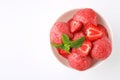 Delicious strawberry ice cream with mint and fresh berries in dessert bowl on white background Royalty Free Stock Photo