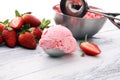 Delicious strawberry ice cream scoop with fresh strawberries on Royalty Free Stock Photo