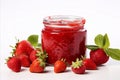 Delicious strawberry jam in glass jar on white background with copy space for text placement Royalty Free Stock Photo