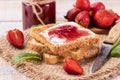 Delicious strawberry jam on toast bread Royalty Free Stock Photo