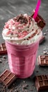 Delicious strawberry milkshake topped with whipped cream and chocolate shavings Royalty Free Stock Photo