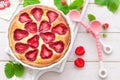 Delicious strawberry tart or cheesecake with fresh berries and cream cheese, closeup Royalty Free Stock Photo