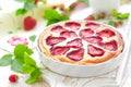 Delicious strawberry tart or cheesecake with fresh berries and cream cheese, closeup Royalty Free Stock Photo