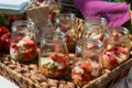 Delicious strawbery desert with granola and chocolate in cute jar.