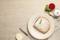 Delicious strudel with cherries on white wooden table, flat lay. Space for text Royalty Free Stock Photo