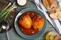 Delicious stuffed peppers served on blue wooden table, flat lay Royalty Free Stock Photo