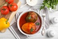 Delicious stuffed peppers served on white wooden table, flat lay Royalty Free Stock Photo