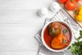 Delicious stuffed peppers served on white wooden table, flat lay. Space for text Royalty Free Stock Photo