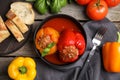 Delicious stuffed peppers served on wooden table, flat lay Royalty Free Stock Photo