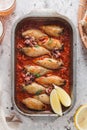 Delicious stuffed squids with tomato sauce