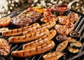 Delicious summer BBQ grilling over the fire Royalty Free Stock Photo