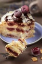 Delicious summer cherry cake on a purple plate Royalty Free Stock Photo