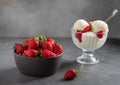 Delicious summer dessert. vanilla ice cream served with fresh strawberries in a glass bowl
