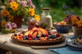 A delicious, summer fruit tart , showcasing an assortment of ripe, juicy fruits, such as peaches, plums, and berries, on outdoor Royalty Free Stock Photo