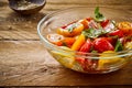 Delicious summer salad with assorted tomatoes